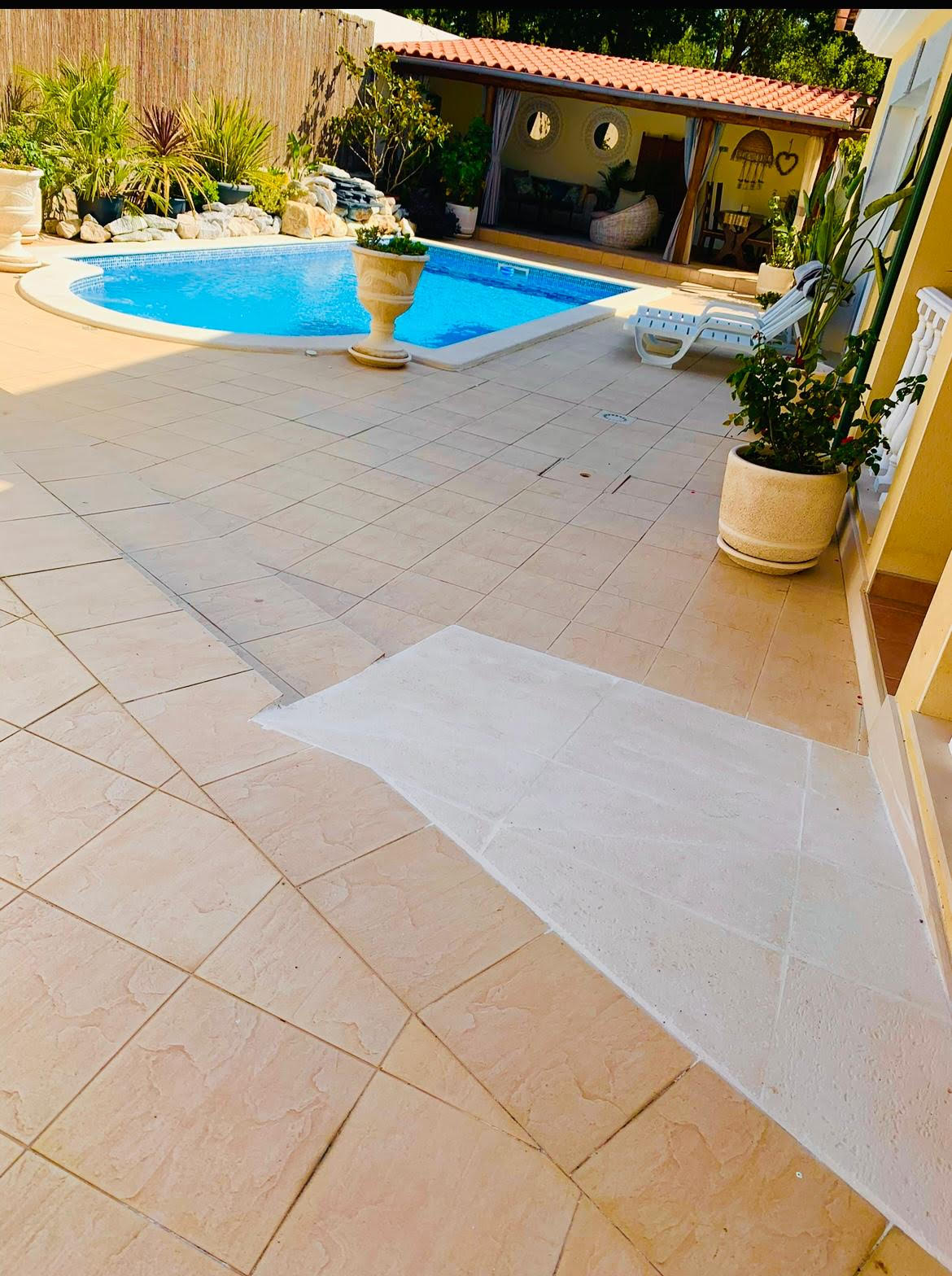 Ramp leading from the terrace toward the saltwater pool