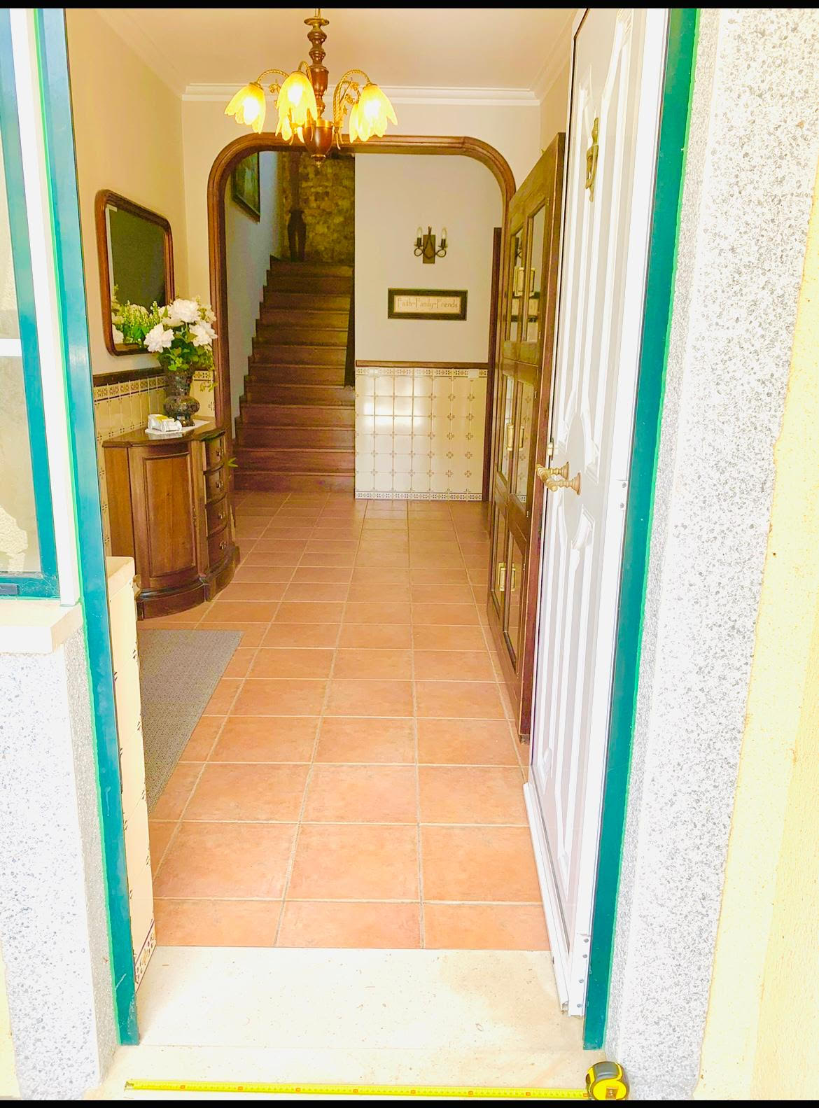 Looking into the entrance hallway from the front door
